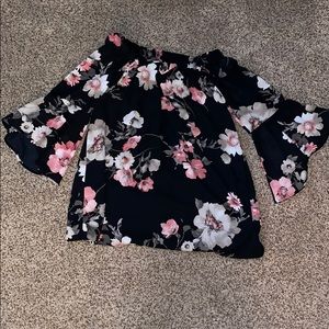 Black floral blouse.